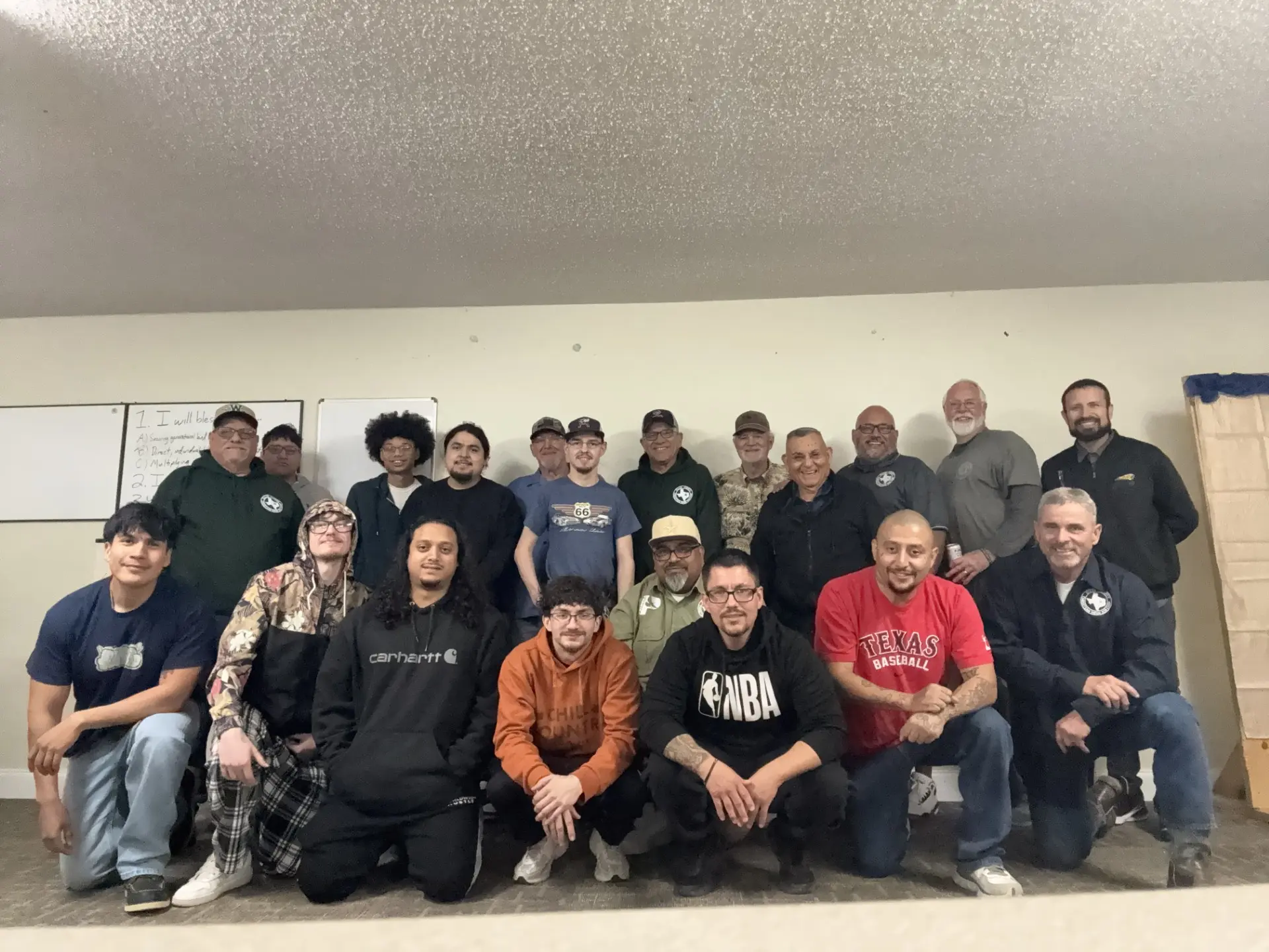 Large group photo of Job Corps students, mentors, and volunteers